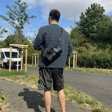  Contemporary top-handle bag carried on shoulder 16