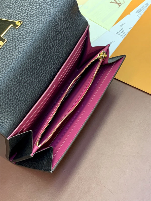  clean-lined top-handle bag styled with outfit