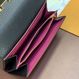  clean-lined top-handle bag styled with outfit