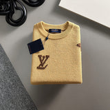 Side profile of Louis Vuitton luxury clothing with signature branding