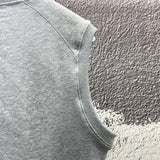 Side profile of Louis Vuitton luxury clothing with logo-detail design