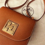 Side view of fluid structured handbag