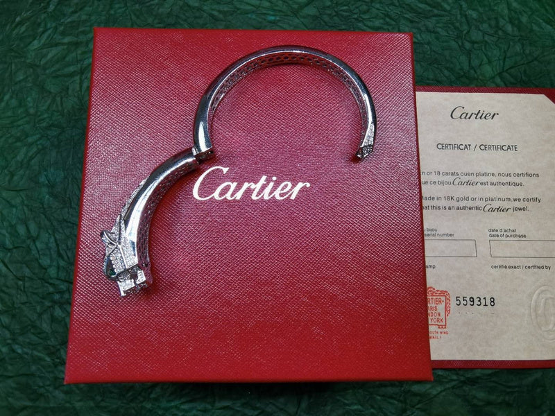 Side view of Cartier unisex jewelry piece