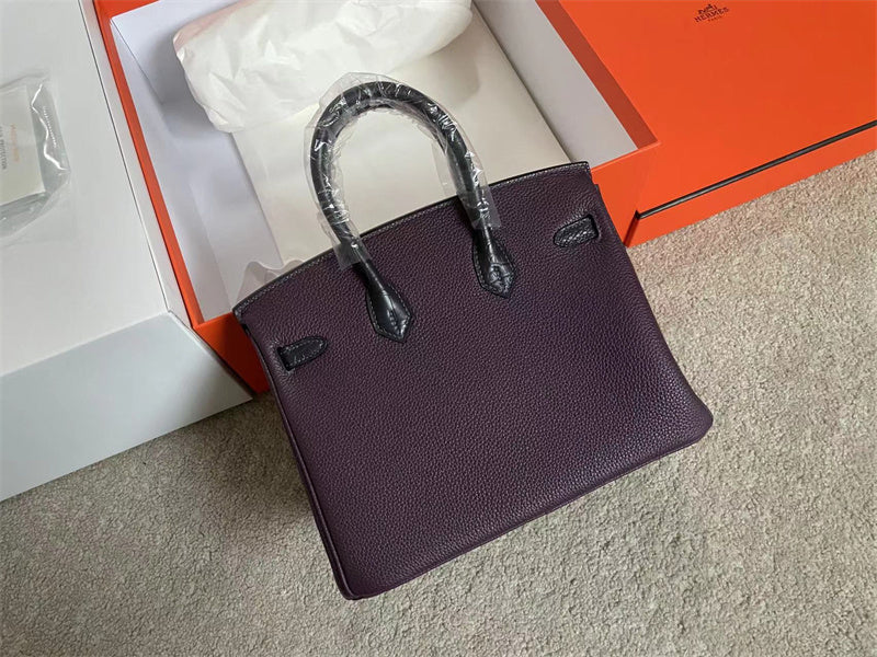 Side view of modernist structured handbag