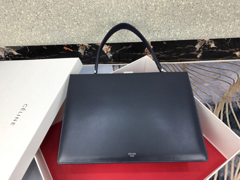 Side profile of statement refined women's handbag – women's premium purse