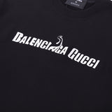 Flat lay presentation of Gucci luxury clothing with signature branding