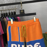 Close-up detail shot of Rhude luxury clothing with relaxed-fit cut