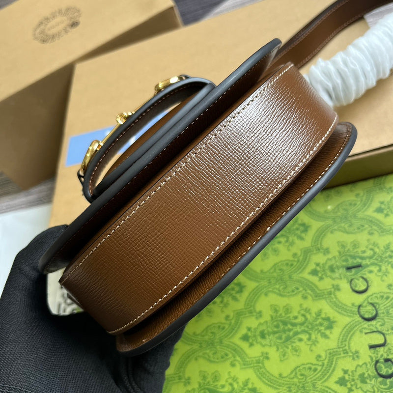 Styled lifestyle shot of refined elevated women's handbag – women's luxury handbag