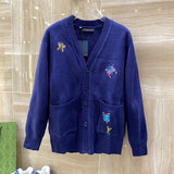 Back view of Louis Vuitton luxury clothing with signature branding