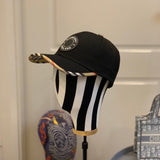 Close-up detail view of Burberry unisex cap