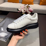 Alexander McQueen classic monochrome luxury sneakers view 9 everyday casual design