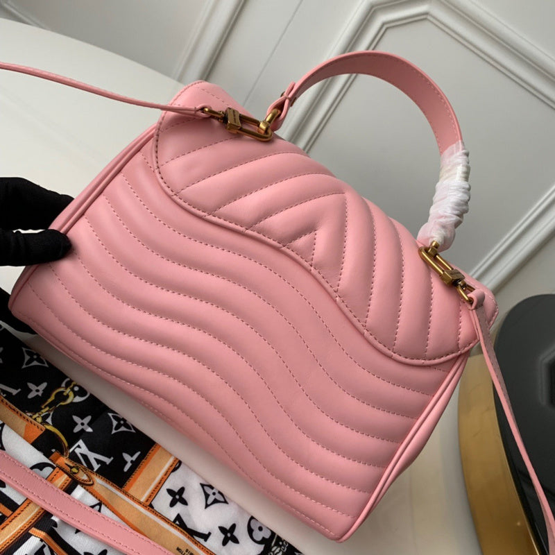 Handle and strap detail of chic polished women's handbag – women's premium purse