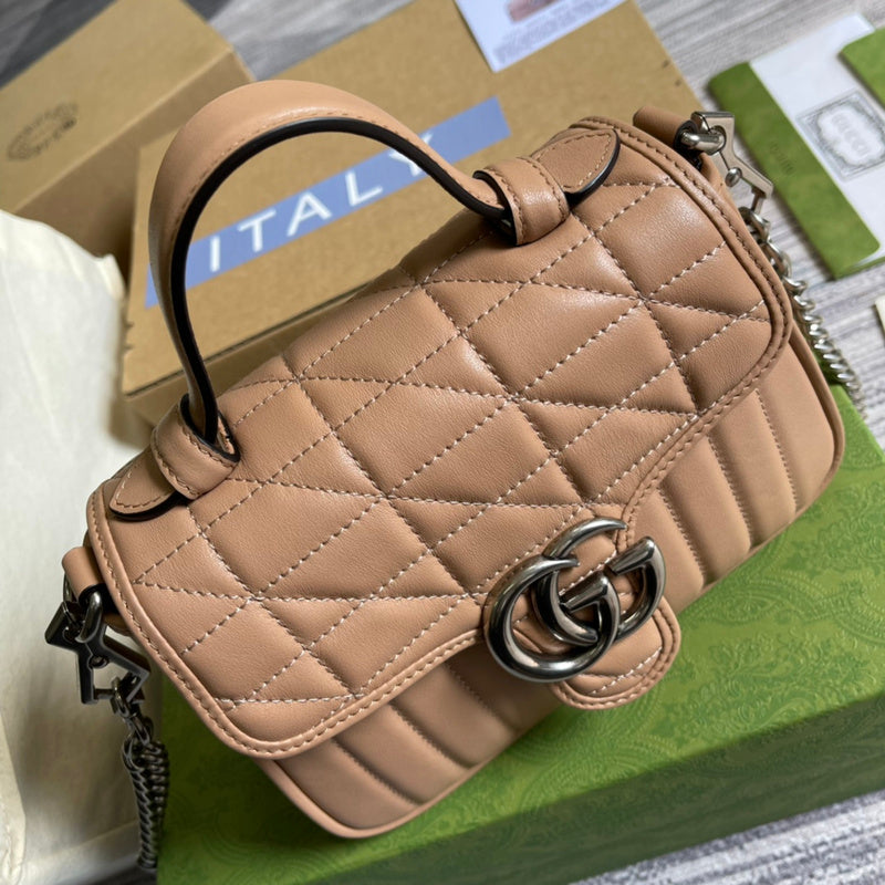 Handle and strap detail of refined everyday-luxe women's handbag – women's statement bag