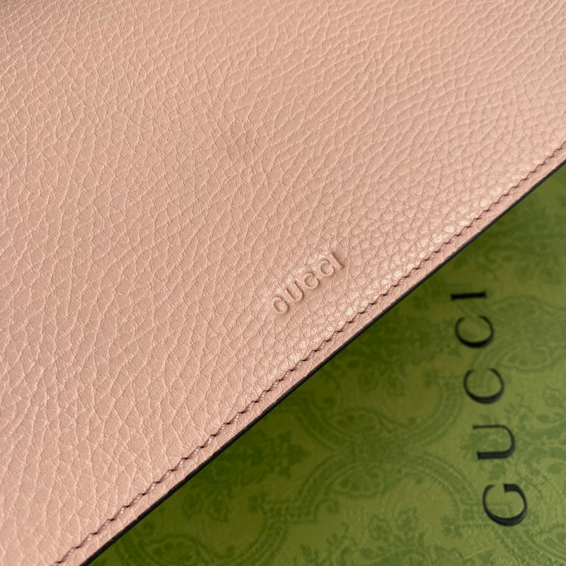 Styled lifestyle shot of chic signature women's handbag – women's statement bag