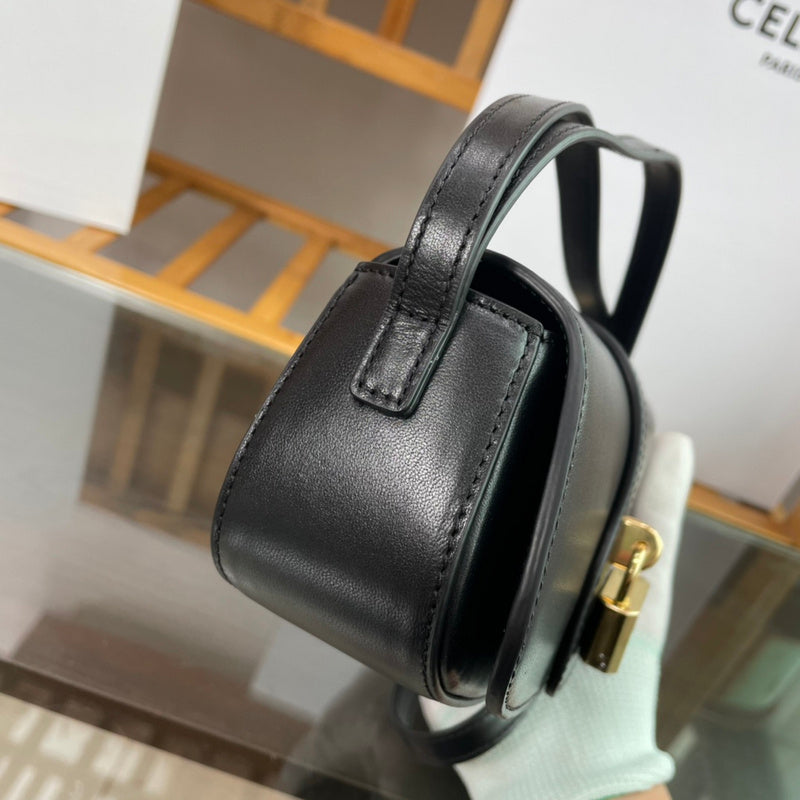Styled lifestyle shot of classic refined women's handbag – women's luxury handbag