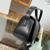 Styled lifestyle shot of classic refined women's handbag – women's luxury handbag