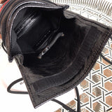 Side profile of elevated structured women's handbag – women's luxury handbag
