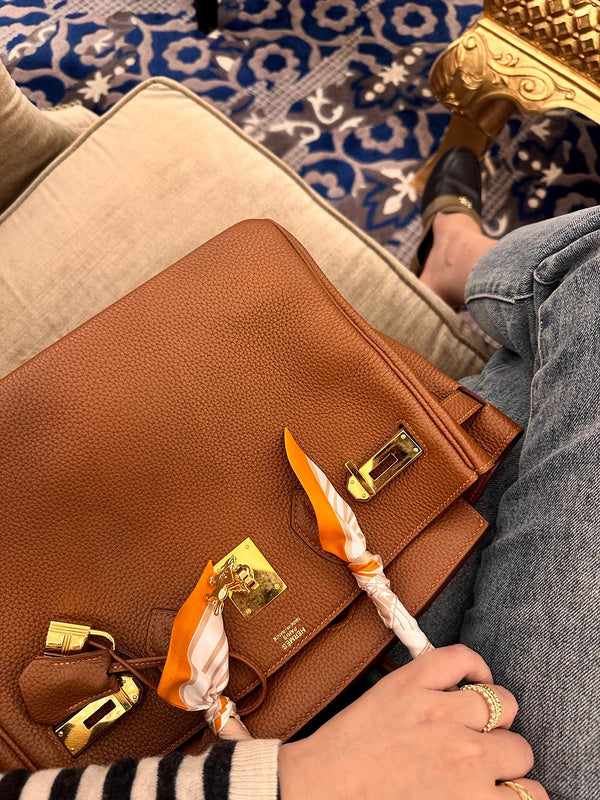 Side view of considered structured handbag
