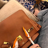 Side view of considered structured handbag