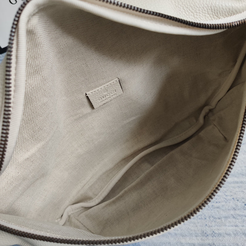 Side profile of signature sleek women's handbag – women's designer-style accessory