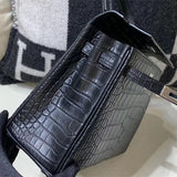 Side view of streamlined structured handbag