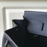 Side view of structured structured handbag