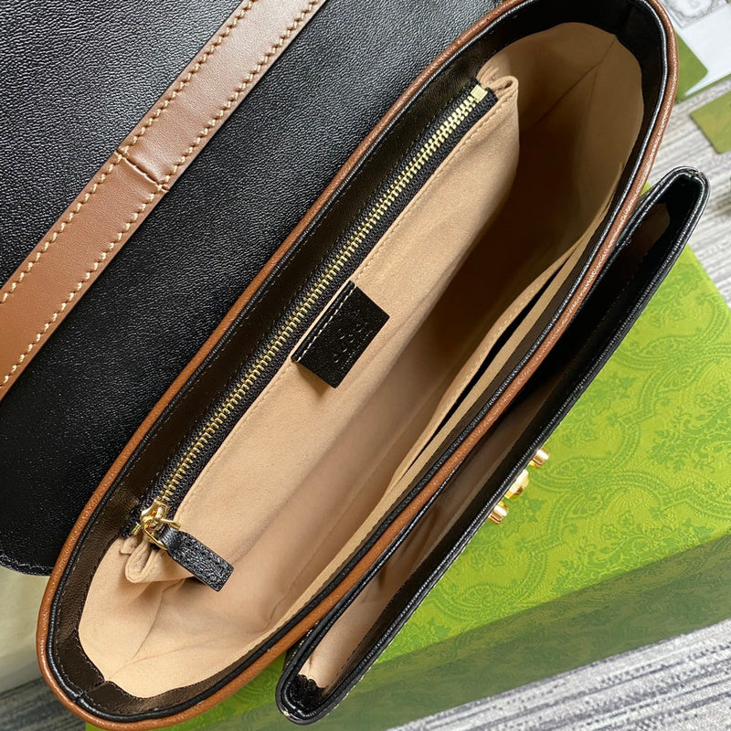 Side profile of chic refined women's handbag – women's luxury accessory