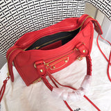 Interior view of classic structured women's handbag – women's statement bag
