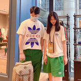 Front view of Gucci luxury clothing with signature branding