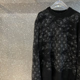 Front view of Louis Vuitton luxury clothing with label-forward styling