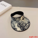Close-up detail view of Louis Vuitton unisex cap