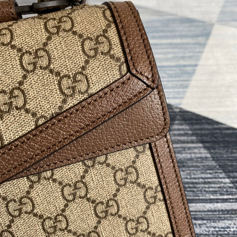 Back view of modern sleek women's handbag – women's luxury accessory