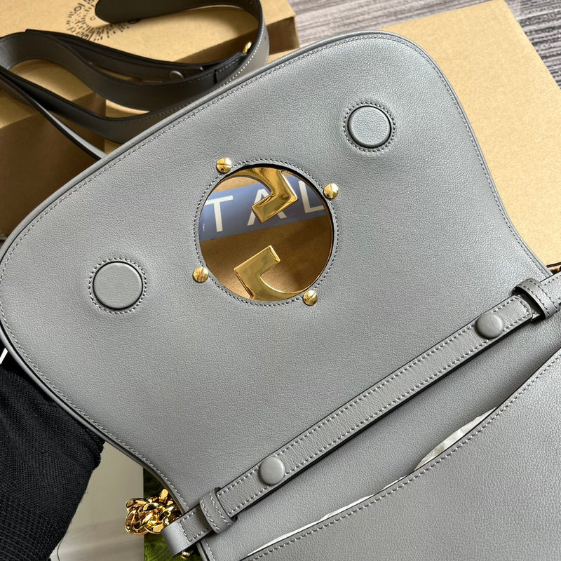 Side profile of refined sleek women's handbag – women's luxury accessory