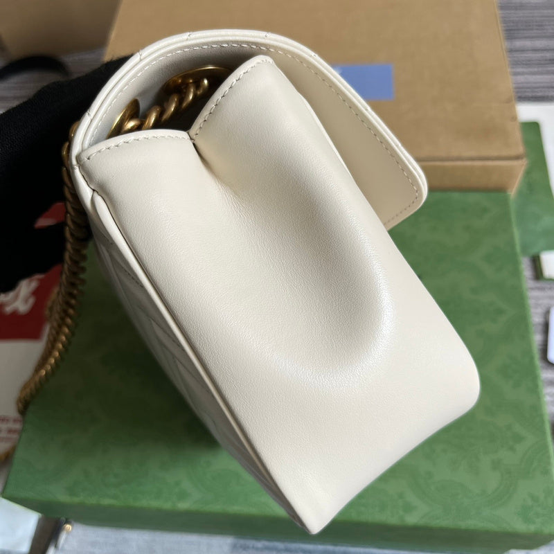 Side view of streamlined structured handbag