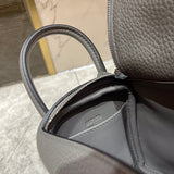 Side view of sophisticated structured handbag
