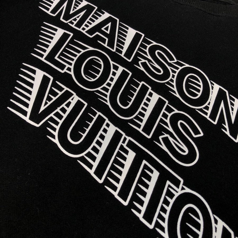 Full styled look of Louis Vuitton luxury clothing with signature branding