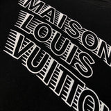 Full styled look of Louis Vuitton luxury clothing with signature branding
