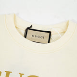 Close-up detail shot of Gucci luxury clothing with relaxed-fit cut