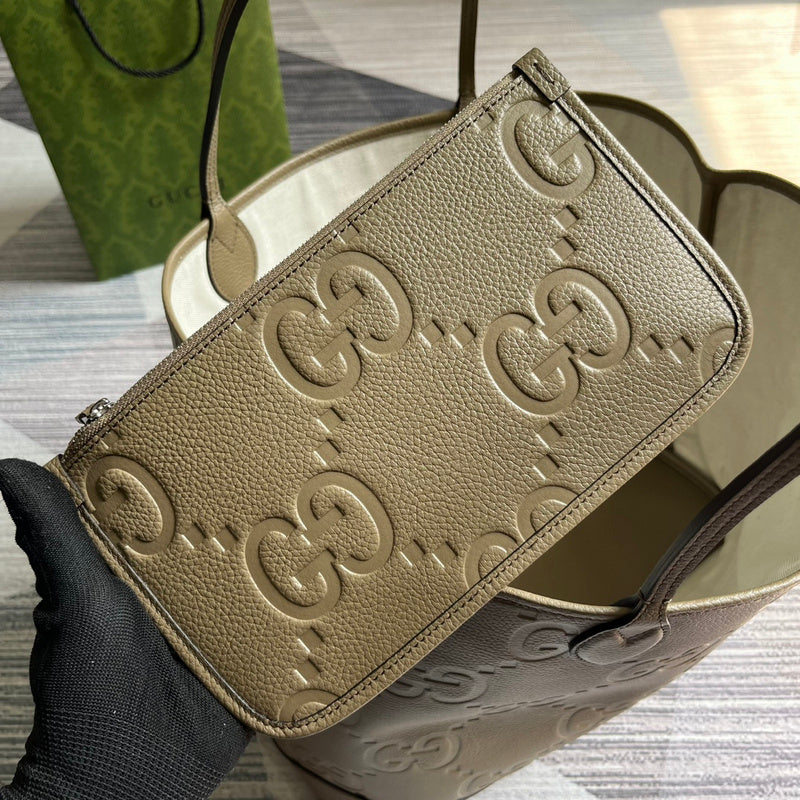 Side profile of signature elevated women's handbag – women's statement bag