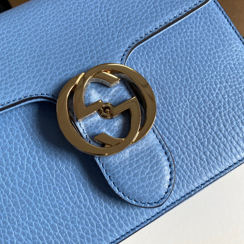 Back view of sleek structured women's handbag – women's statement bag