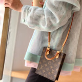  Signature satchel carried on shoulder 16