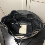 Close-up detail of refined signature women's handbag – women's statement bag
