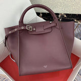 Side profile of signature statement women's handbag – women's premium purse
