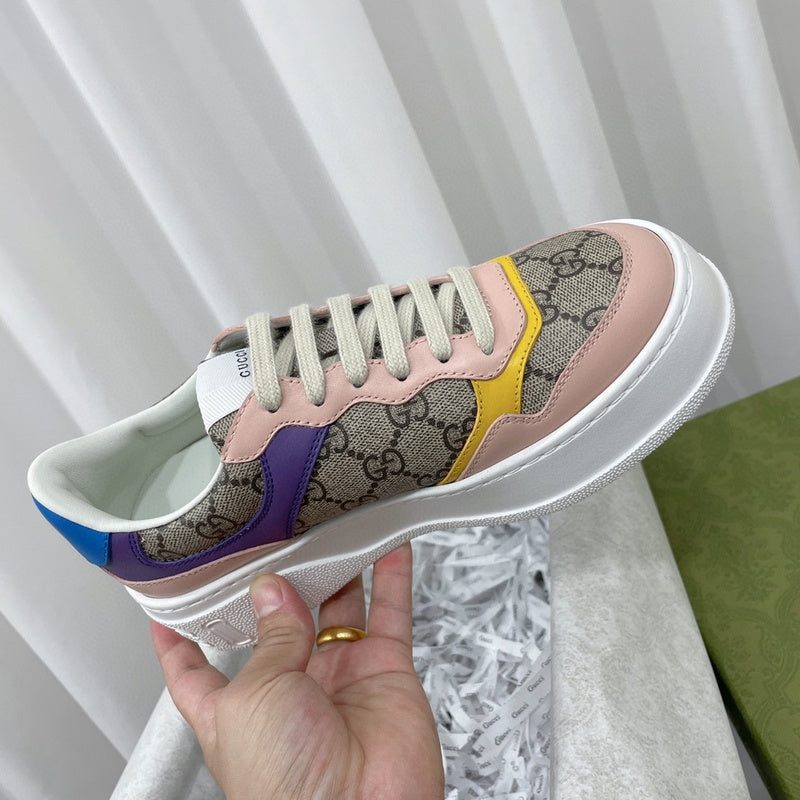 Side profile of Gucci classic monochrome sneakers low-top design