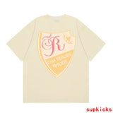 Side profile of Rhude luxury clothing with monogram-inspired silhouette
