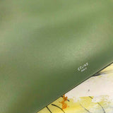 Handle and strap detail of refined modern women's handbag – women's statement bag