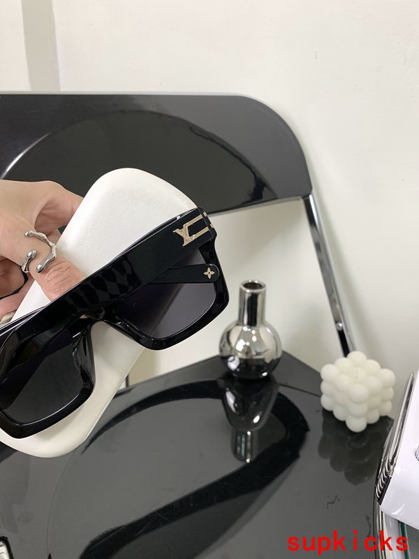 Angled view of Louis Vuitton unisex sunglasses