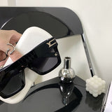 Angled view of Louis Vuitton unisex sunglasses