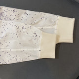 Close-up detail shot of Louis Vuitton luxury clothing with streetwear-inspired cut
