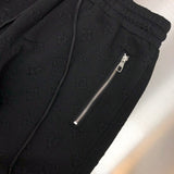Full styled look of Louis Vuitton luxury clothing with signature branding
